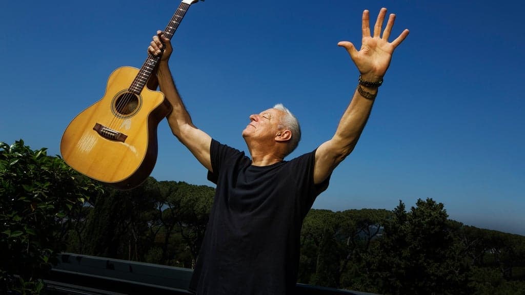 Promotional image for Tommy Emmanuel w/ Trey Hensley