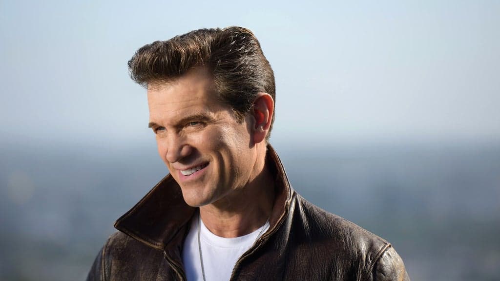 Promotional image for Chris Isaak