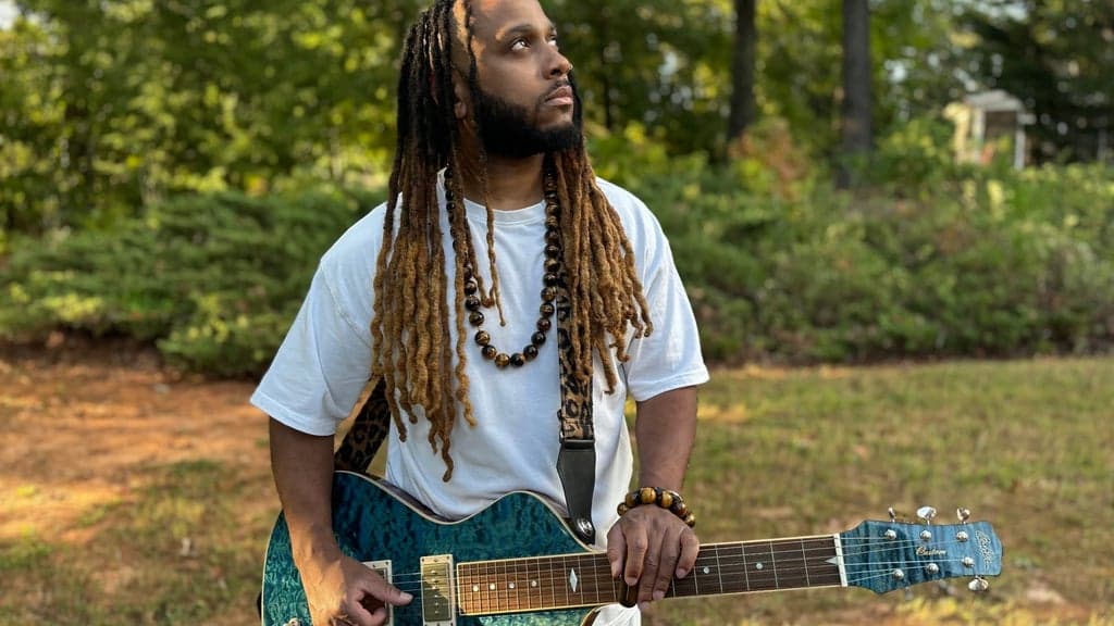 Promotional image for AJ Ghent and His Singing Guitar