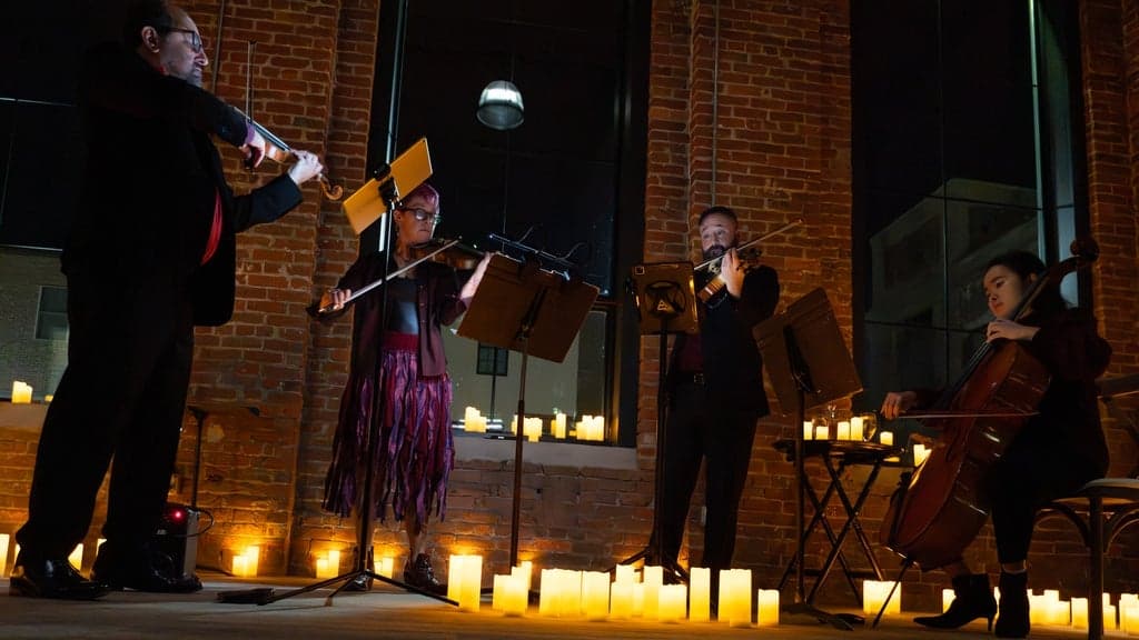 Promotional image for NEPA Philharmonic: Candle Lit 90's