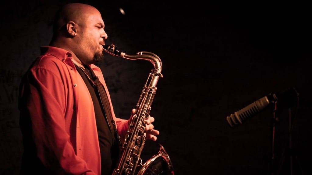 Promotional image for Troy Roberts Quartet
