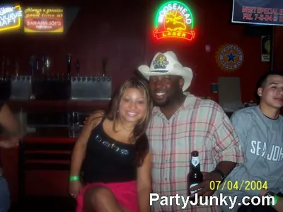 Guests posing for the camera at Bahama Joes, Jul 4, 2004