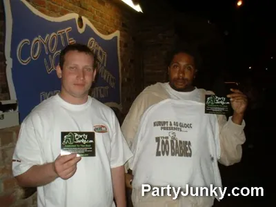 Guests posing for the camera at Coyote Ugly Bar & Grill, May 29, 2004