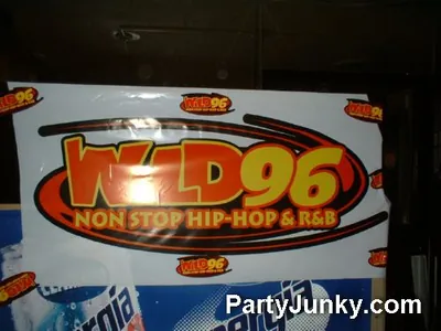 Venue sign and event banner at Coyote Ugly Bar & Grill, May 29, 2004