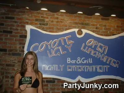 Guests posing for the camera at Coyote Ugly Bar & Grill, May 29, 2004