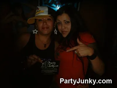 Guests posing for the camera at Coyote Ugly Bar & Grill, May 29, 2004