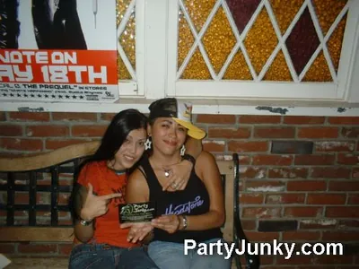 Guests posing for the camera at Coyote Ugly Bar & Grill, May 29, 2004