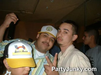 Guests posing for the camera at Coyote Ugly Bar & Grill, May 29, 2004