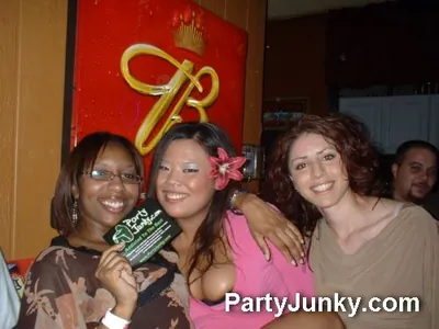 Guests posing for the camera at Coyote Ugly Bar & Grill, May 29, 2004