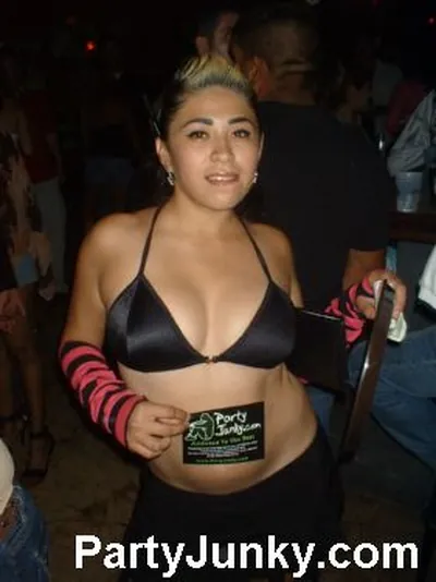Guests posing for the camera at Coyote Ugly Bar & Grill, Jun 5, 2004