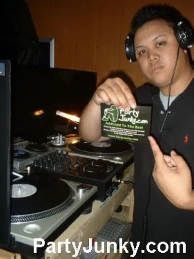 DJ at the turntables at Coyote Ugly Bar & Grill, Jun 5, 2004