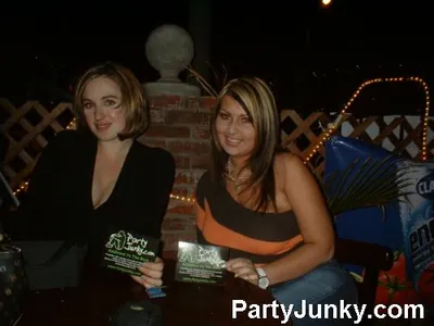Guests posing for the camera at Coyote Ugly Bar & Grill, Jun 5, 2004