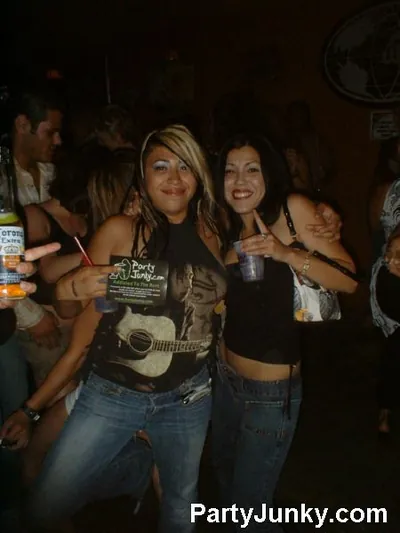 Guests posing for the camera at Coyote Ugly Bar & Grill, Jun 12, 2004