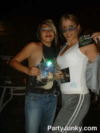 Guests posing for the camera at Coyote Ugly Bar & Grill, Jun 12, 2004