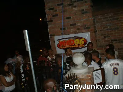Guests outside Coyote Ugly Bar & Grill at night, Jun 12, 2004
