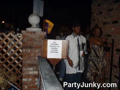 Guests outside Coyote Ugly Bar & Grill at night, Jun 19, 2004