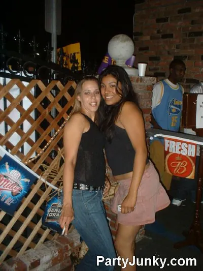 Guests posing for the camera at Coyote Ugly Bar & Grill, Jun 19, 2004