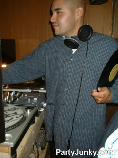 DJ at the turntables at Coyote Ugly Bar & Grill, Jul 3, 2004
