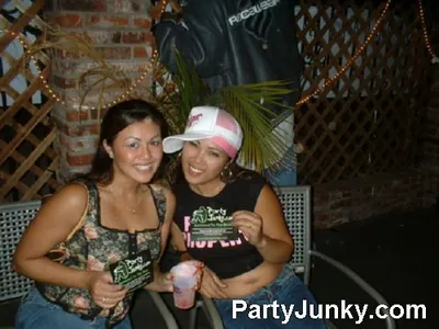 Guests posing for the camera at Coyote Ugly Bar & Grill, Jul 3, 2004