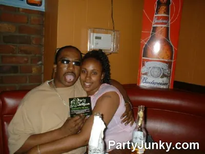 Guests posing for the camera at Coyote Ugly Bar & Grill, Jul 3, 2004