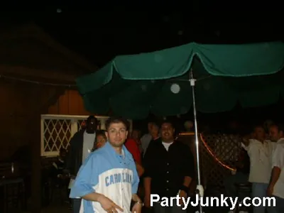 Guests outside Coyote Ugly Bar & Grill at night, Jul 3, 2004