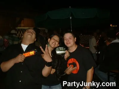 Guests posing for the camera at Coyote Ugly Bar & Grill, Jul 3, 2004
