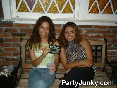 Guests posing for the camera at Coyote Ugly Bar & Grill, Jul 3, 2004