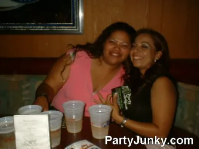 Guests posing for the camera at Coyote Ugly Bar & Grill, Jul 10, 2004