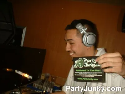 DJ at the turntables at Coyote Ugly Bar & Grill, Jul 10, 2004