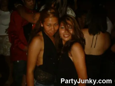 Guests posing for the camera at Coyote Ugly Bar & Grill, Jul 10, 2004