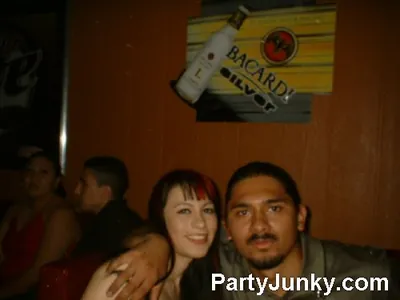Guests posing for the camera at Coyote Ugly Bar & Grill, Jul 10, 2004