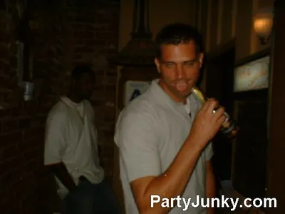 Guests posing for the camera at Coyote Ugly Bar & Grill, Jul 10, 2004
