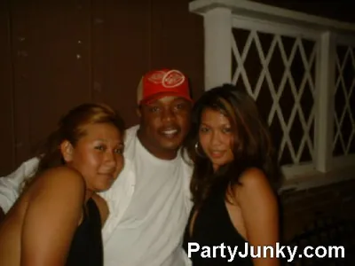 Guests posing for the camera at Coyote Ugly Bar & Grill, Jul 10, 2004