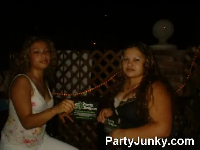 Guests posing for the camera at Coyote Ugly Bar & Grill, Jul 10, 2004