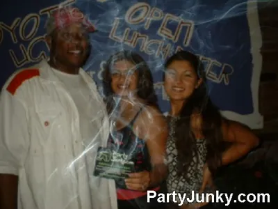 Guests posing for the camera at Coyote Ugly Bar & Grill, Jul 10, 2004