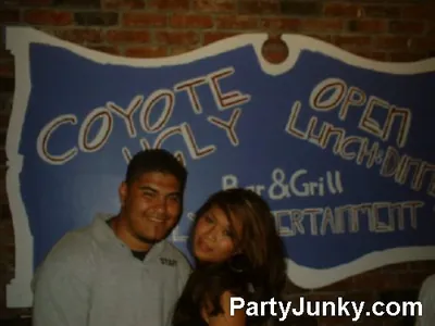 Guests posing for the camera at Coyote Ugly Bar & Grill, Jul 10, 2004