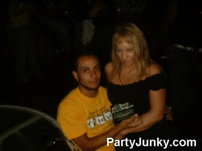 Guests posing for the camera at Coyote Ugly Bar & Grill, Jul 10, 2004
