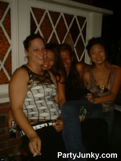 Guests posing for the camera at Coyote Ugly Bar & Grill, Jul 10, 2004