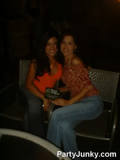 Guests posing for the camera at Coyote Ugly Bar & Grill, Jul 10, 2004