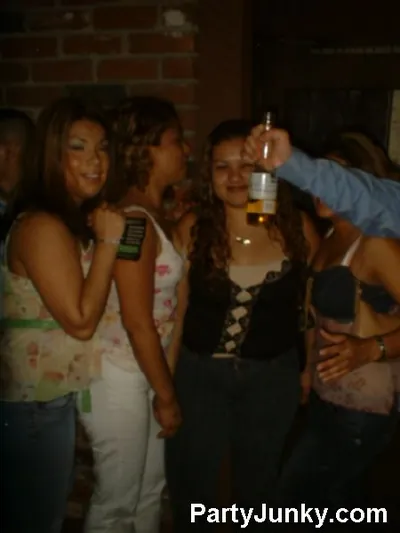 Guests posing for the camera at Coyote Ugly Bar & Grill, Jul 10, 2004