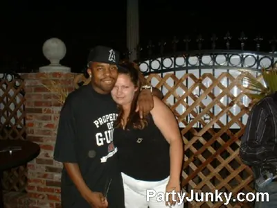 Guests posing for the camera at Coyote Ugly Bar & Grill, Jul 31, 2004