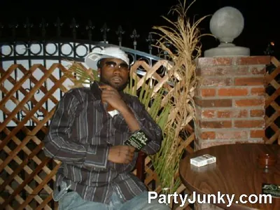 Guests posing for the camera at Coyote Ugly Bar & Grill, Jul 31, 2004
