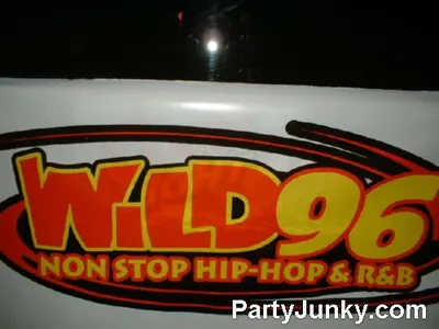 Venue sign and event banner at Coyote Ugly Bar & Grill, Jul 31, 2004