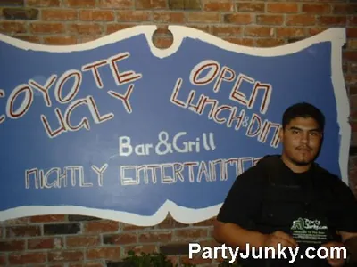 Guests posing for the camera at Coyote Ugly Bar & Grill, Jul 31, 2004