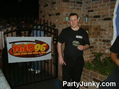 Guests posing for the camera at Coyote Ugly Bar & Grill, Jul 31, 2004