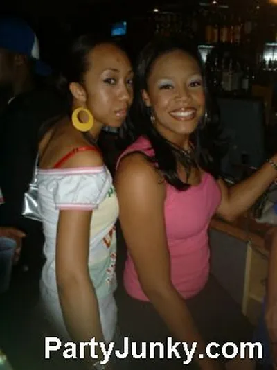 Guests posing for the camera at Coyote Ugly Bar & Grill