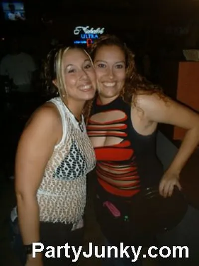 Guests posing for the camera at Coyote Ugly Bar & Grill