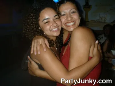 Guests posing for the camera at Coyote Ugly Bar & Grill