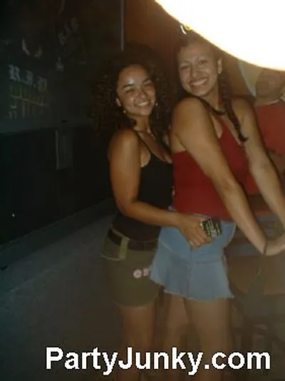 Guests posing for the camera at Coyote Ugly Bar & Grill