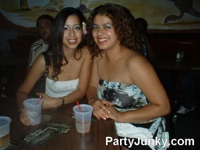 Guests posing for the camera at Coyote Ugly Bar & Grill